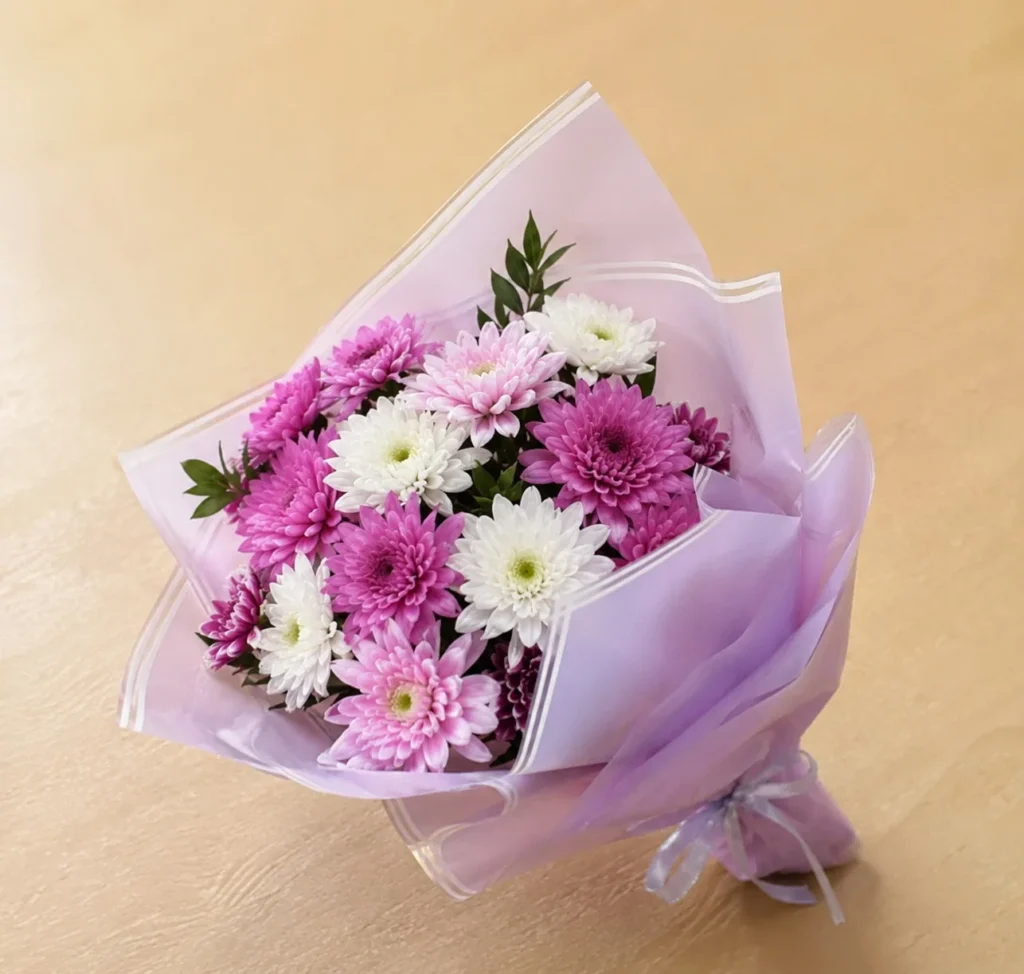 Pink and white chrysanthemum posy in lilac wrap